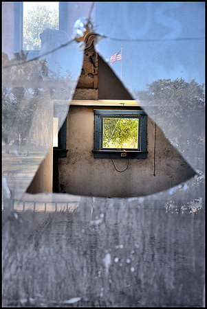 Through the broken glass of time